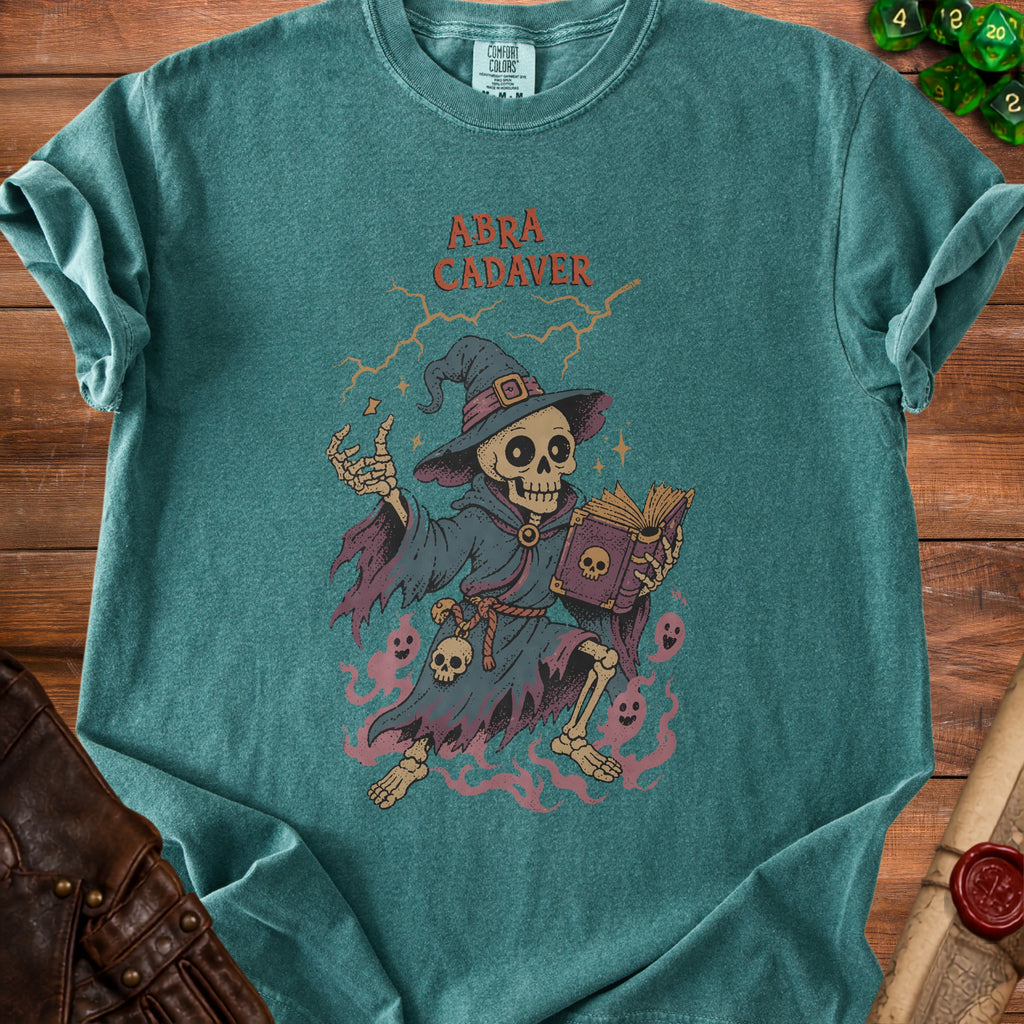 Skeleton wizard reading spellbook with "Abra Cadaver" text and ghostly apparitions.