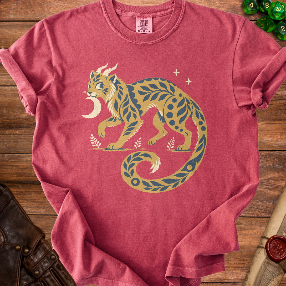 T-shirt with mystical cat, moon, stars, and floral design.