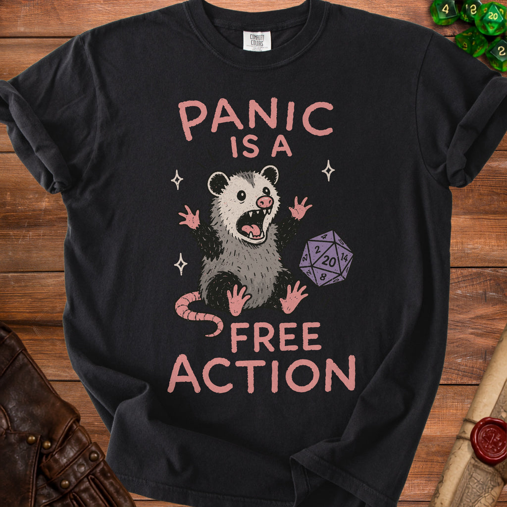Black t-shirt with a panicked possum and dice, reading "Panic is a free action".