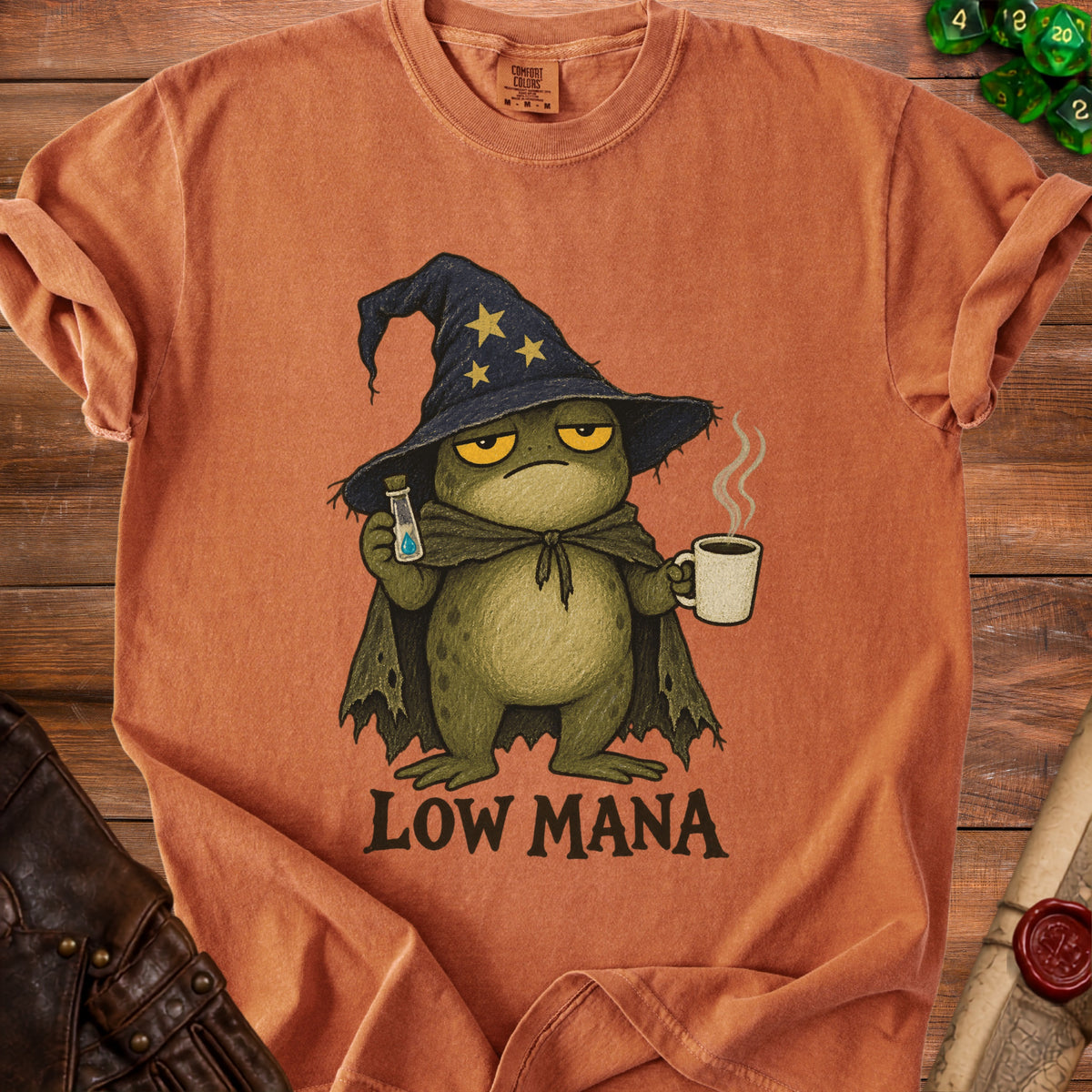 Orange t-shirt with frog wizard graphic and "LOW MANA" text.