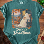 Ghost sitting in a rocking chair on a porch with pumpkins and autumn leaves, holding coffee. Text says "Dead to Deadlines."