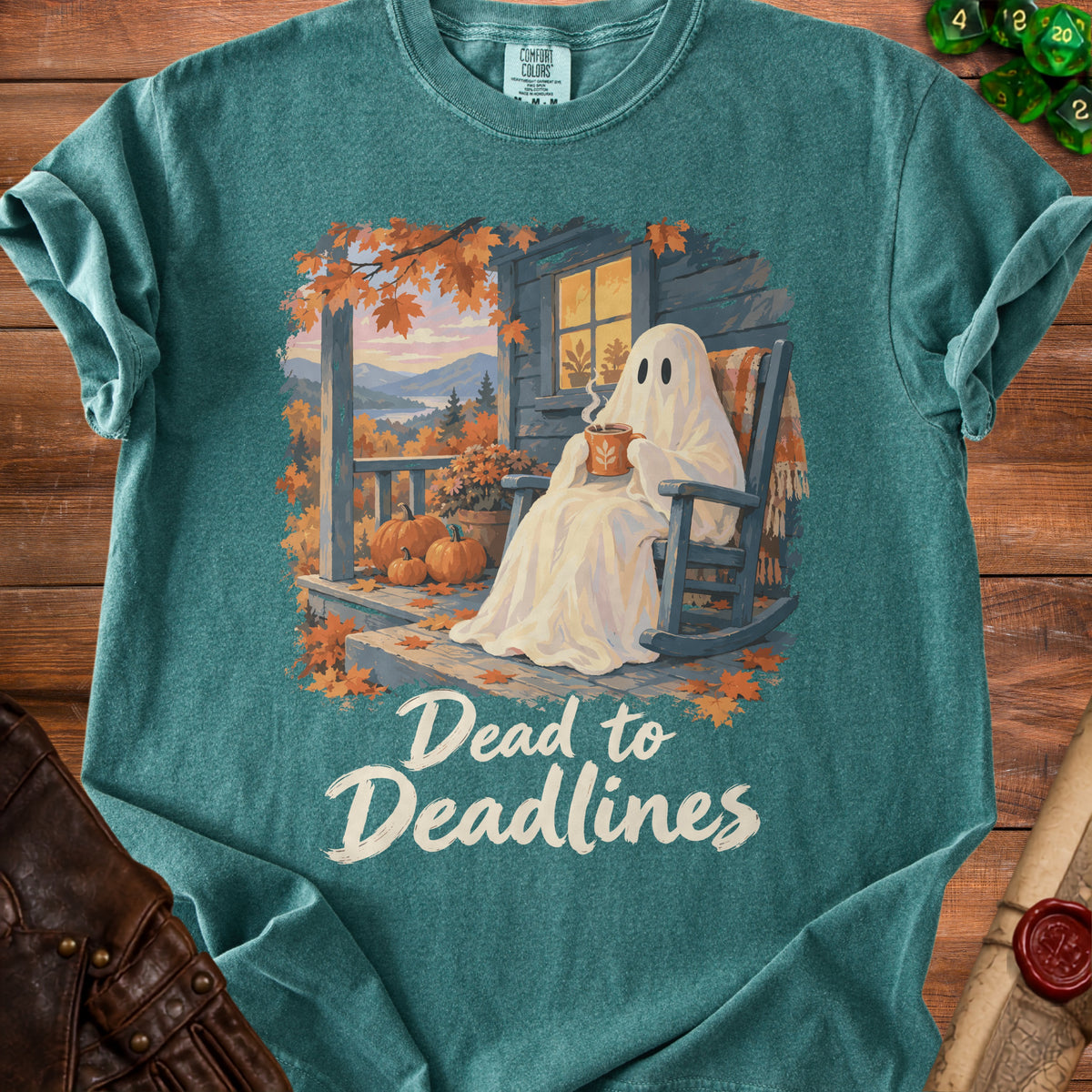 Ghost sitting in a rocking chair on a porch with pumpkins and autumn leaves, holding coffee. Text says "Dead to Deadlines."