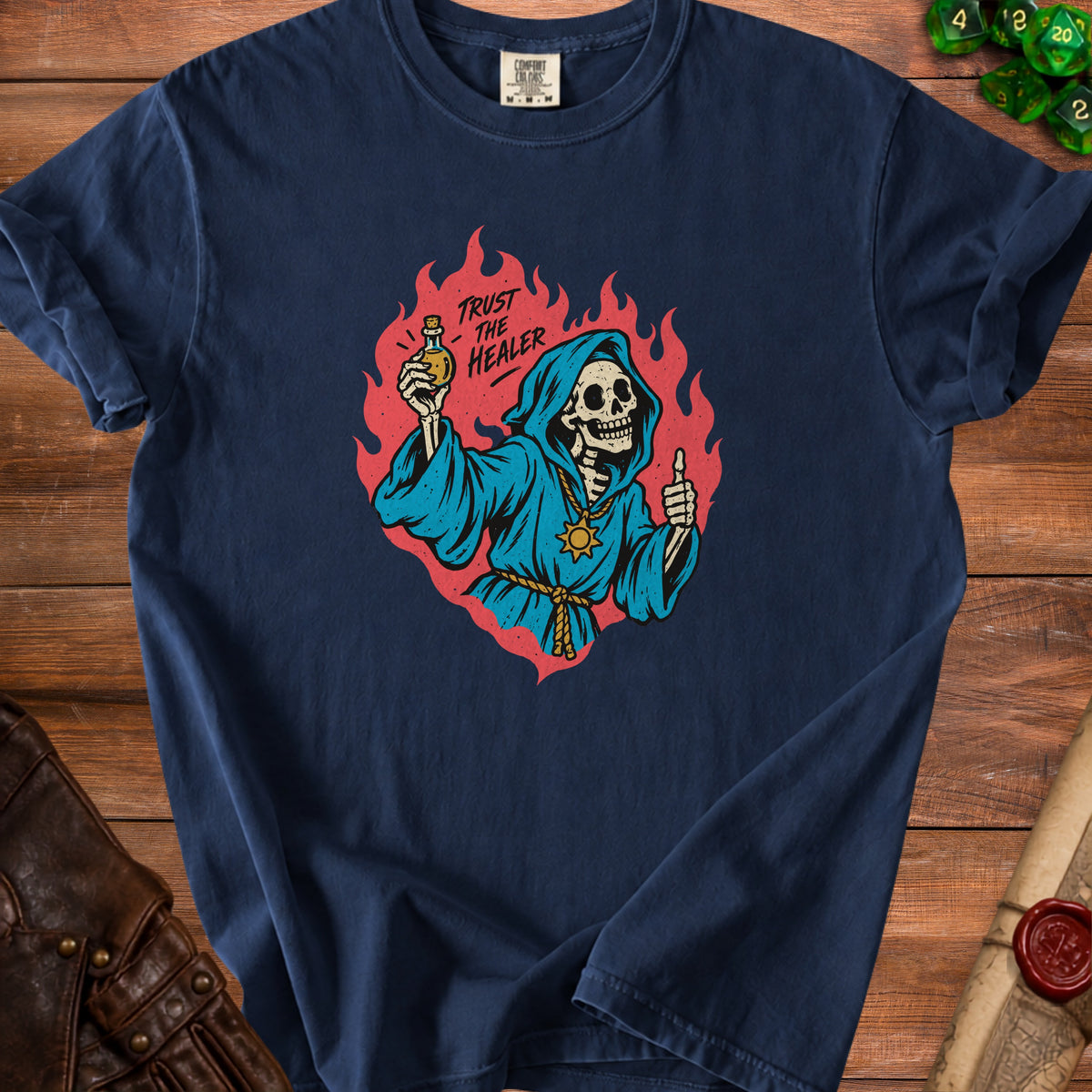 Dark blue t-shirt with a grim reaper holding a potion and text "Trust the Healer".