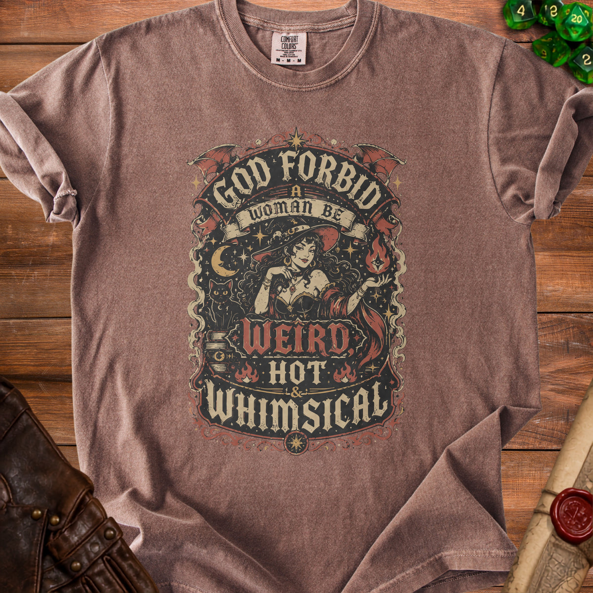 Brown t-shirt with "God forbid a woman be weird, hot & whimsical" design.
