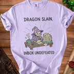T-shirt with skeletal wizard graphic and text "Dragon Slain, Inbox Undefeated".