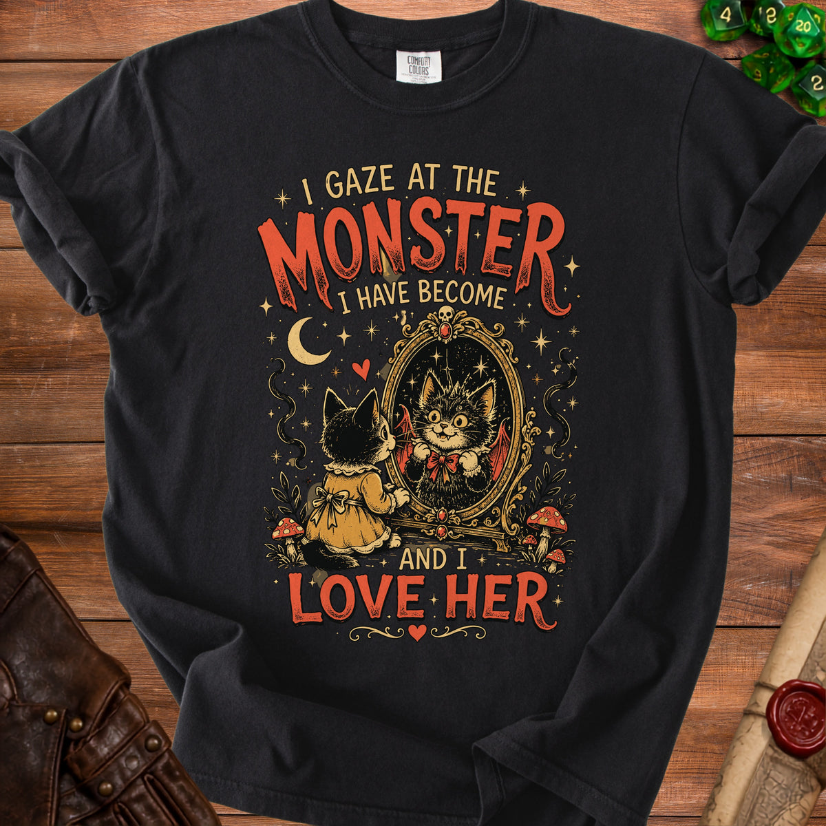 Black t-shirt with text "I gaze at the monster I have become and I love her."