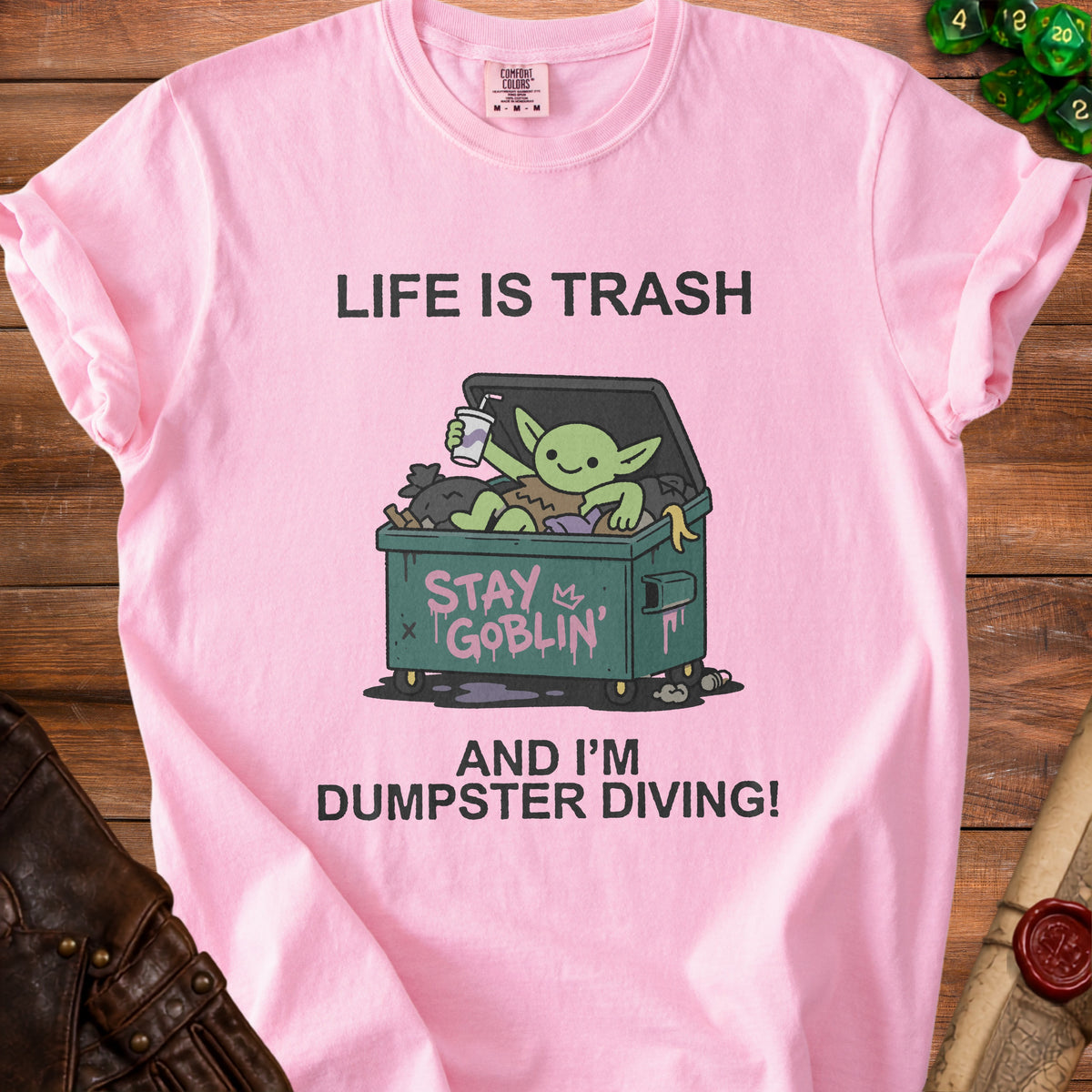 Pink t-shirt with graphic: "Life is Trash, Stay Goblin, and I'm Dumpster Diving!"