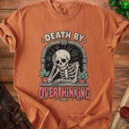 T-shirt with distressed skeleton graphic saying "Death by Overthinking"