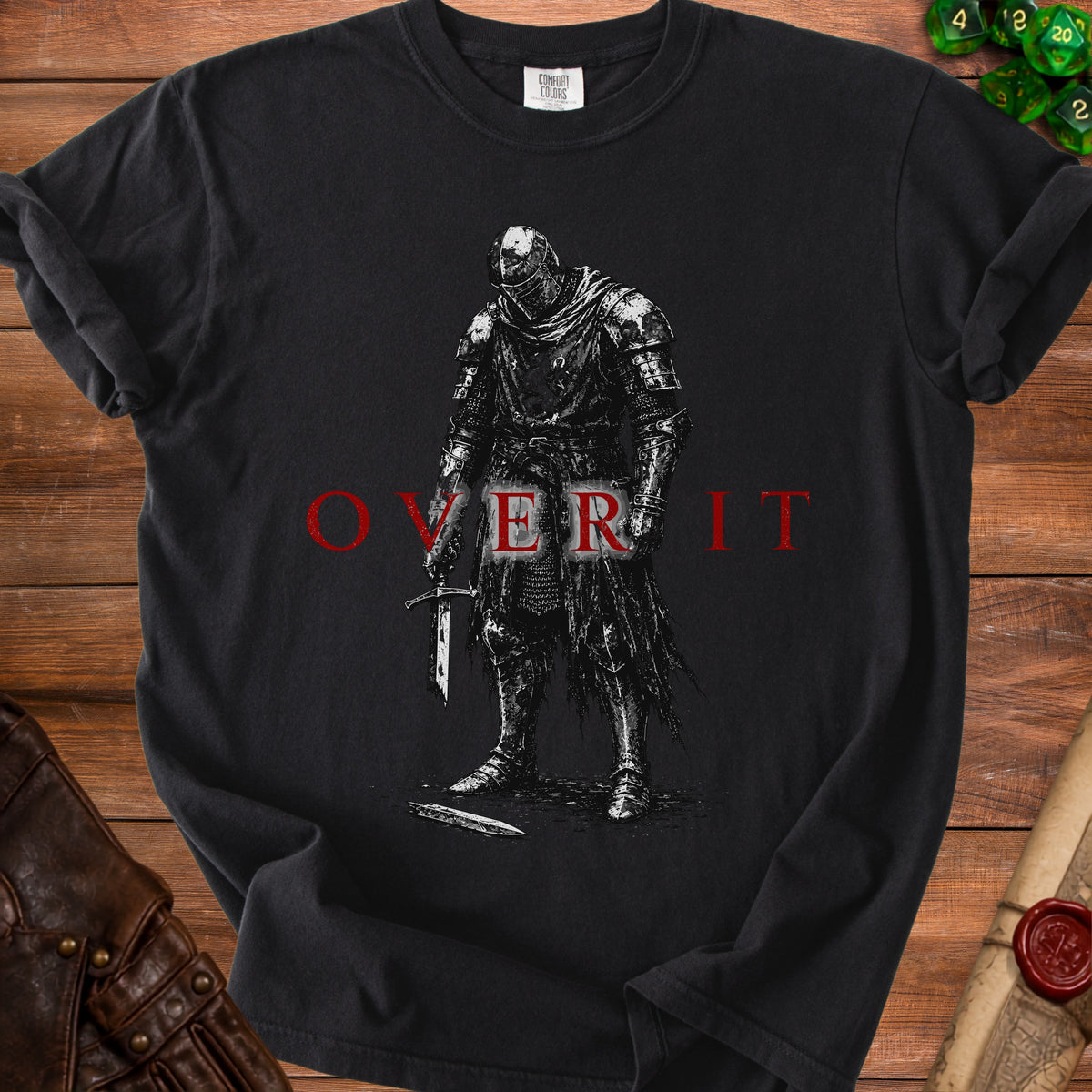 Black t-shirt with a detailed drawing of a knight holding a sword and the text "OVER IT".