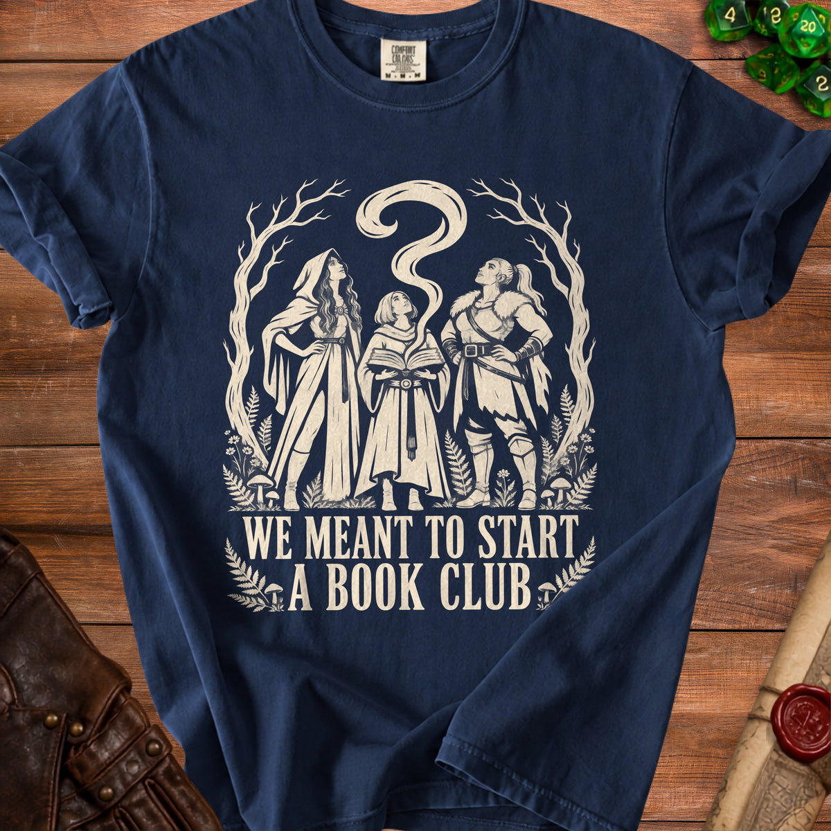 Navy t-shirt with fantasy illustration and "WE MEANT TO START A BOOK CLUB" text.