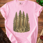 Pink t-shirt with a painting of a wizard and a goblin in a forest.