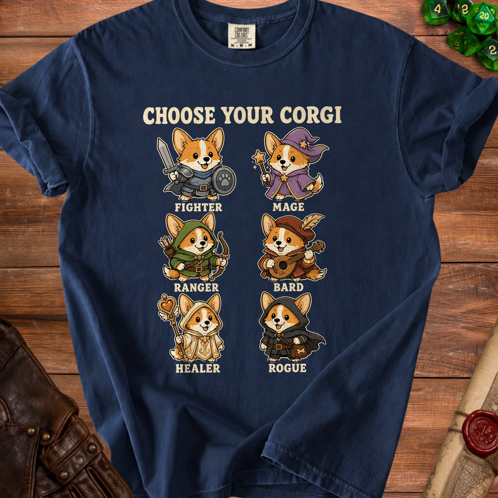 Dark blue t-shirt with six corgi characters dressed as fantasy characters: fighter, mage, ranger, bard, healer, and rogue.