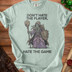 Light green t-shirt with "Don't Hate the Flayer, Hate the Game" text and illustration.