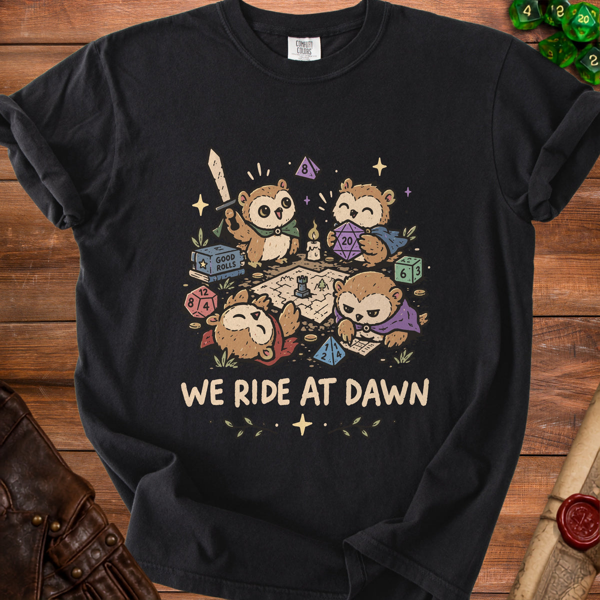 Black t-shirt with four cartoon owls playing a tabletop role-playing game with dice.