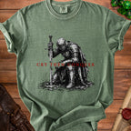 Green t-shirt with knight kneeling and text "CRY THEN CONQUER".