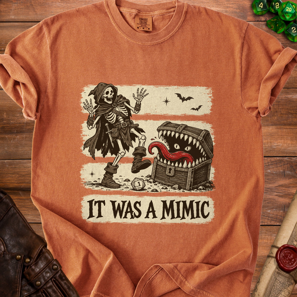 Skeleton standing next to an open treasure chest with a monstrous tongue and teeth. Text reads "IT WAS A MIMIC".