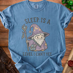 Blue t-shirt with wizard graphic and text "Sleep is a Level I Can't Yet".