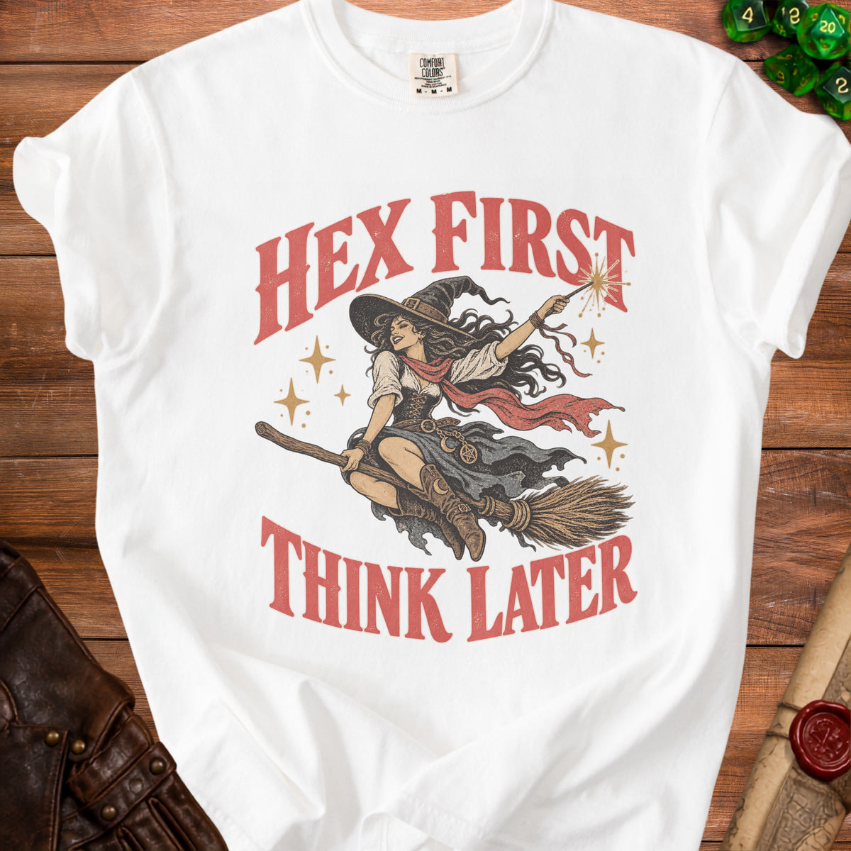 White t-shirt with vintage witch riding broom, "Hex First Think Later" text.