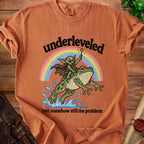 Goblin riding frog under rainbow, text "underleveled but somehow still the problem".