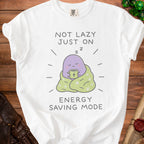 White t-shirt with graphic text "Not Lazy Just On Energy Saving Mode".