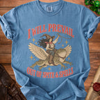 Blue t-shirt with winged frog, witch, and text "I Will Prevail Out of Spite & Spells".