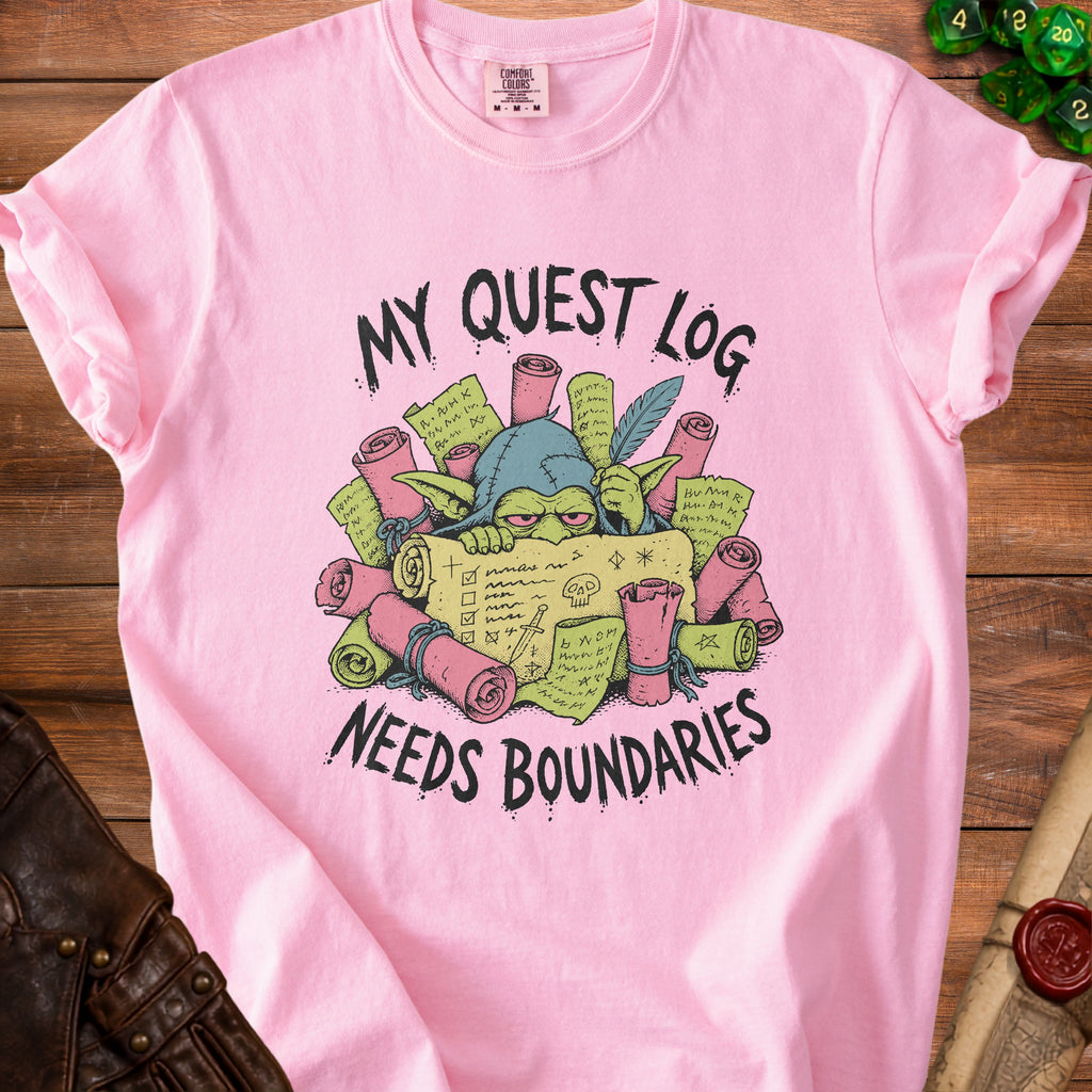 Pink t-shirt with goblin character and text "My Quest Log Needs Boundaries".