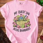 Pink t-shirt with goblin character and text "My Quest Log Needs Boundaries".