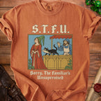 Terracotta t-shirt featuring medieval-style graphic of a cat stealing fish with the text S.T.F.U.