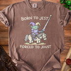 Brown t-shirt with cartoon elf jester riding a horse, text "BORN TO JEST FORCED TO JOUST".