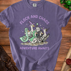 Purple t-shirt with ducks in fantasy armor and costumes, text "FLOCK AND CHAOS ADVENTURE AWAITS".