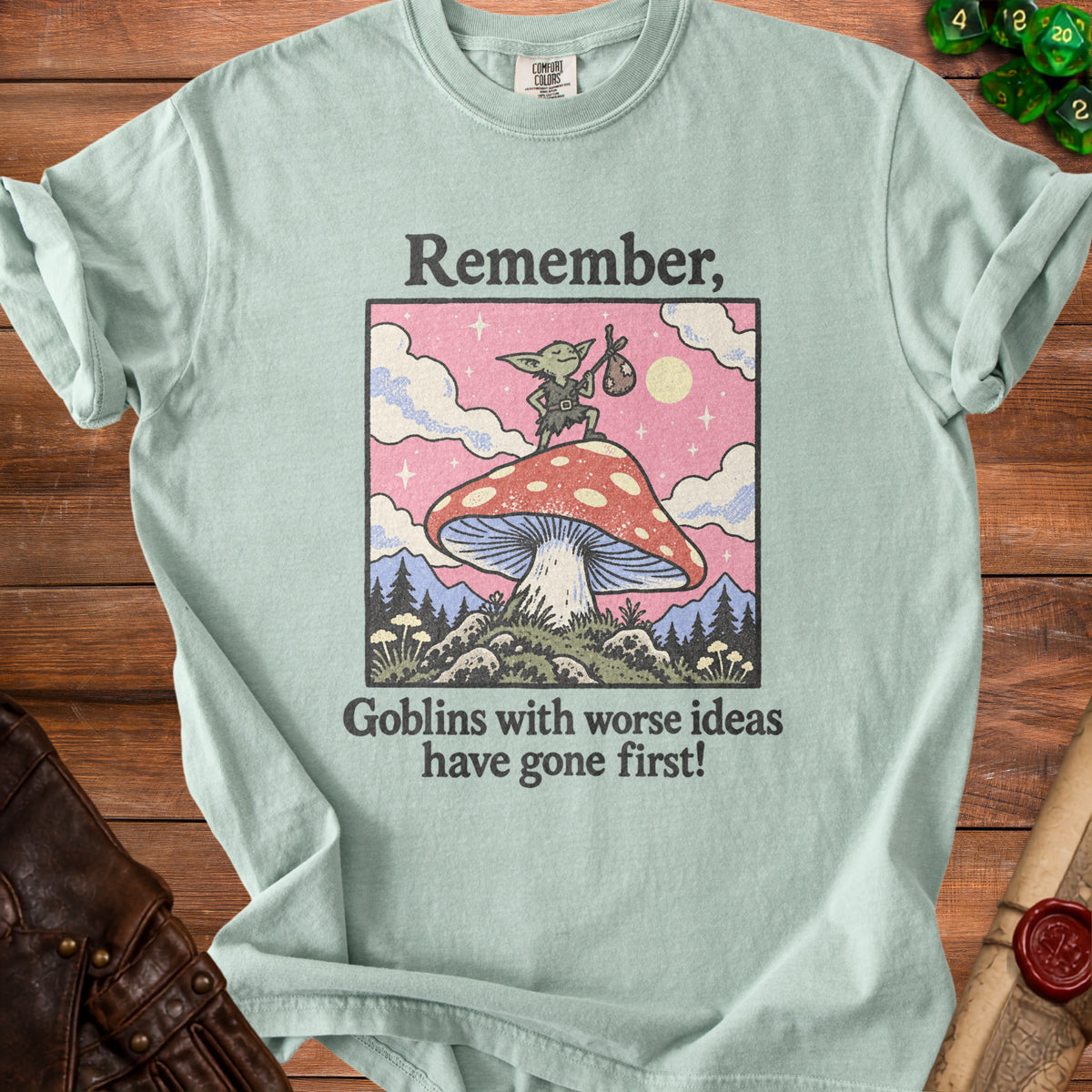 Light green t-shirt with "Remember, Goblins with worse ideas have gone first!" text and goblin graphic.