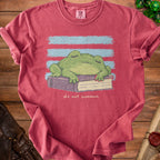 A sleeping frog rests on a book with blue stripes above and "do not summon" text below.