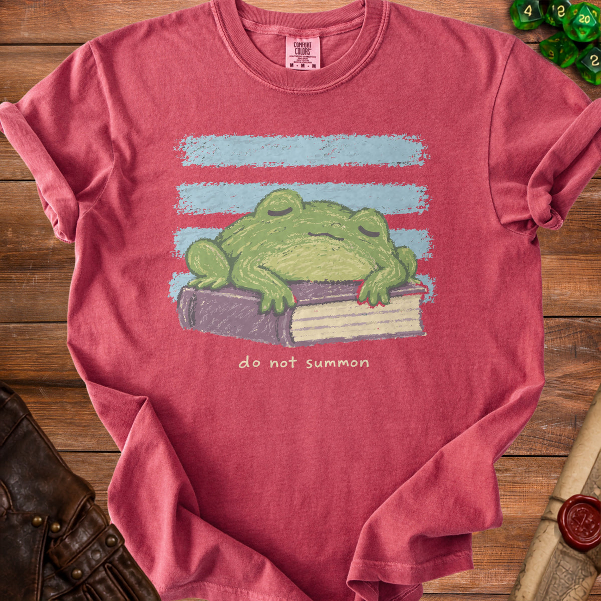 A sleeping frog rests on a book with blue stripes above and "do not summon" text below.