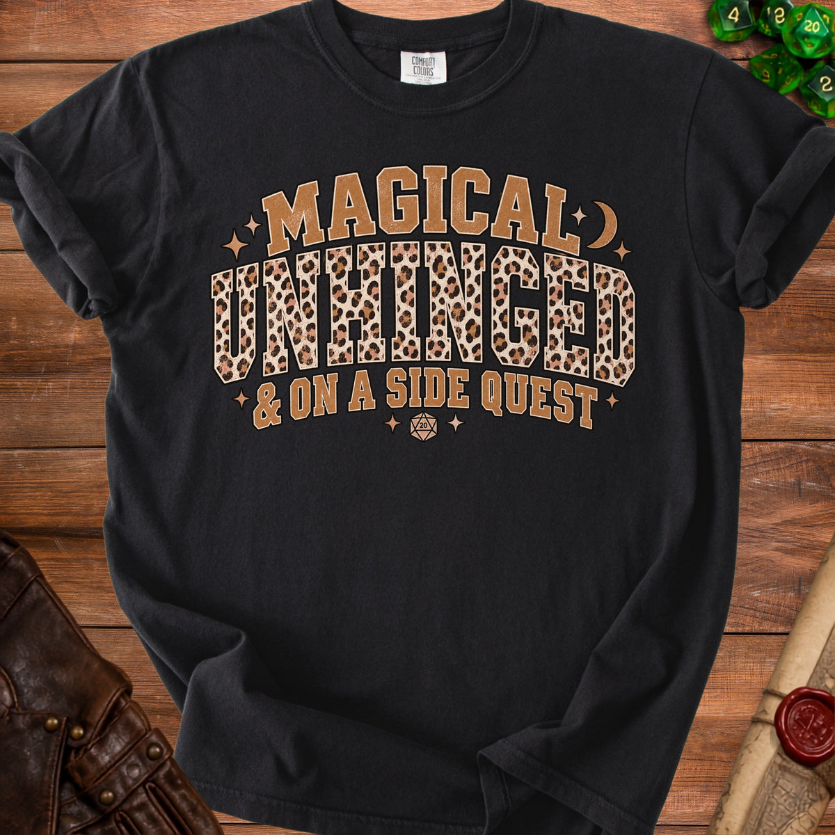 Black t-shirt with "Magical Unhinged & on a Side Quest" text and leopard print.