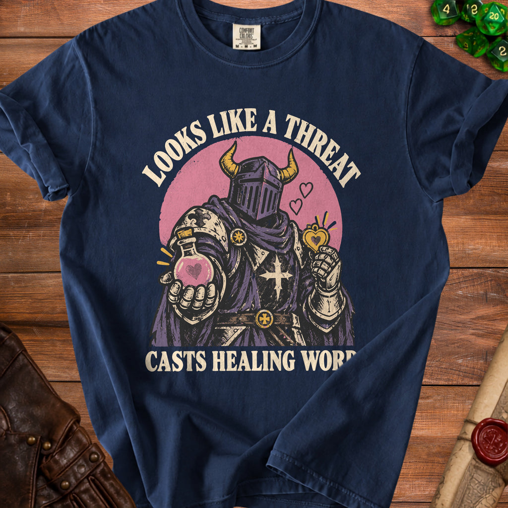 Dark blue t-shirt with knight graphic: "Looks like a threat casts healing word."