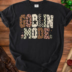 Black t-shirt with "GOBLIN MODE" text in retro, patterned lettering.