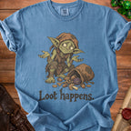 Blue t-shirt with a goblin, a sack of loot, and "Loot happens." text.