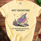 Yellow t-shirt with "Not Ghosting I'm Resting My Social Dexterity" and sleeping wizard graphic.