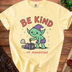 Yellow t-shirt with a cartoon goblin holding a "TOOT" lever next to a skull box.