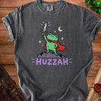 Frog in cape and helmet holding sword, with "HUZZAH" text.