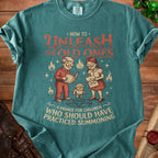 Teal t-shirt with "How to Unleash the Old Ones: A Primer for Children Who Should Have Practiced Summoning" text.