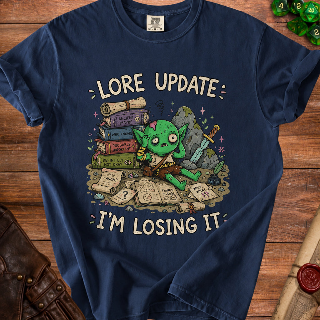 Goblin surrounded by books and scrolls with text "Lore Update: I'm Losing It."