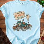 Light blue Comfort Colors t-shirt with a skeleton warrior and ghost graphic saying "I love a dramatic exit".