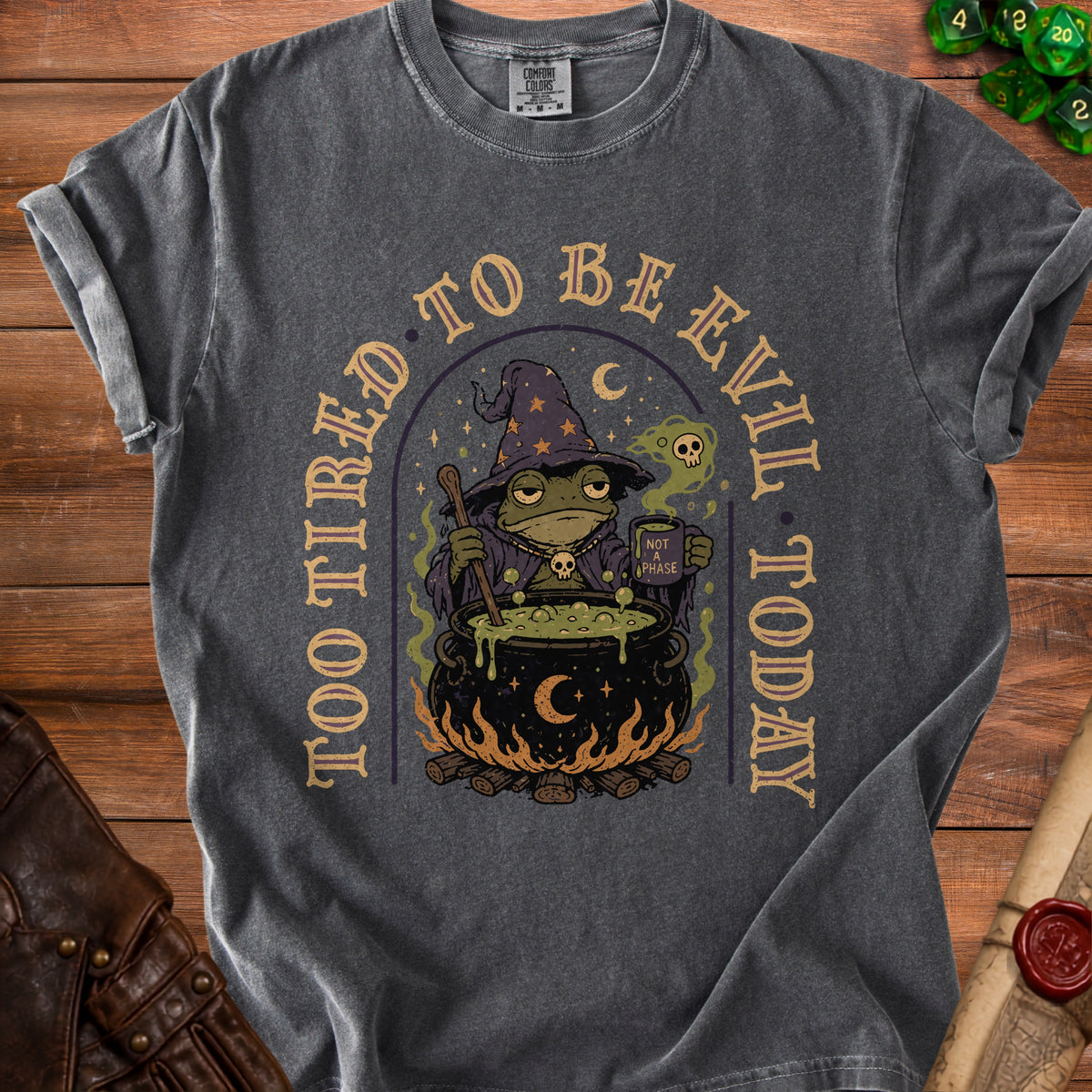Grey t-shirt with a witch frog, cauldron, and "Too Tired To Be Evil Today" text.