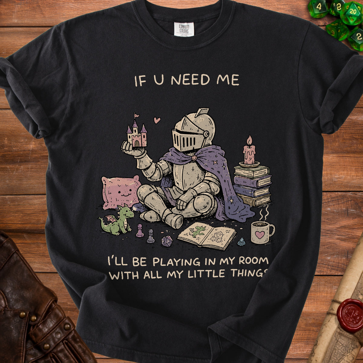 Knight with castle, dragon, books, and dice, text "IF U NEED ME I'LL BE PLAYING IN MY ROOM WITH ALL MY LITTLE THINGS".