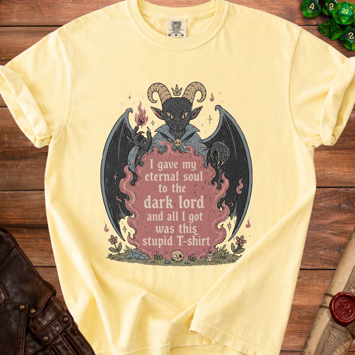 Yellow t-shirt with demon illustration and "I gave my eternal soul to the dark lord and all I got was this stupid T-shirt" text.