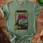 Green t-shirt with a grim reaper gaming graphic and text "Skill Issues".