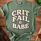Green t-shirt with "Crit Fail Babe" text and a d20 die graphic.