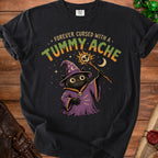 Black t-shirt with wizard cat graphic and "Forever Cursed with a Tummy Ache" text.