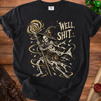 Skeleton wizard with staff and text "WELL, SHIT.." on a black t-shirt.